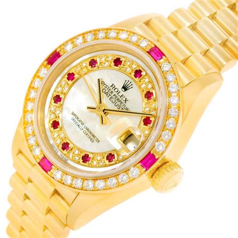 gold rolex with rubies.